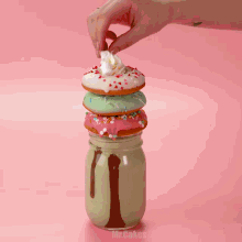 a donut with marshmallows and whipped cream on top