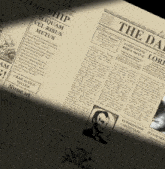 a newspaper with a picture of abraham lincoln on the front