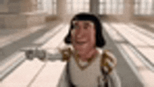 a cartoon character from shrek is standing in a room with his arms outstretched and smiling .