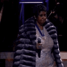 Aretha Franklin Coat Drop GIF - Aretha Franklin Coat Drop Fur Coat GIFs