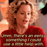 a woman in a red sweater says " umm there 's an eeasy something i could use a little help with "