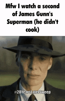 a man in a suit and hat says mfw i watch a second of james gunn 's