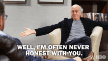 a man is sitting in a chair with his arms outstretched and says well i 'm often never honest with you