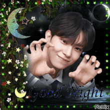 a picture of a man with a crescent moon and the words good night