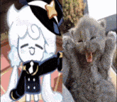 a cookie and a kitten are sitting next to each other . the kitten is yawning and the cookie is smiling .