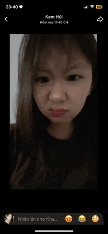 a phone screen shows a picture of a girl named kem huii