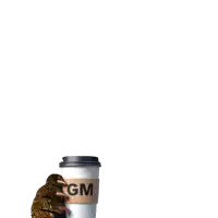 a person holding a cup of coffee with the word gm on it