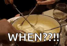 a person is dipping a piece of cheese into a pot of fondue with the words " when " written on the bottom