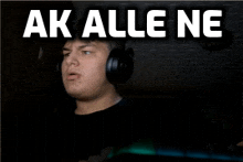 a man wearing headphones with the words ak alle ne written above him
