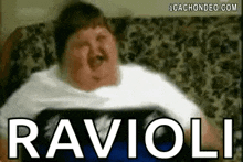 a fat man is sitting on a couch with the word ravioli written on it .