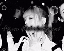 a black and white photo of a girl with the words 4tune entertainment written on the bottom