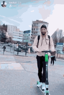 a man is riding a lime scooter on the street