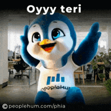a penguin mascot is wearing a shirt that says oyyy teri on it