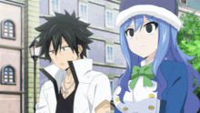 a man and a girl are standing next to each other in front of a building