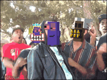 a group of people are dancing in a park with a 4gifs.com logo in the corner