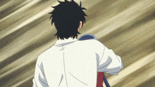 a man in a white shirt is holding a red bag