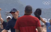 High Five Justin Rose GIF - High Five Justin Rose International Olympic Committee250days GIFs