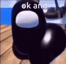 a black among us character with the words ok and written above it