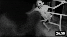 a black and white photo of a monster with a time of 2650