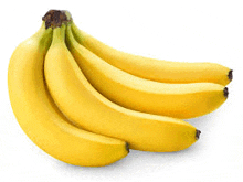 a bunch of bananas on a white surface