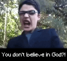 a man wearing glasses is screaming and saying `` you don t believe in god '' .