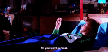 a person is laying in bed with a blue blanket and the words so you won 't get lost on the bottom