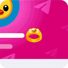 a gold ring with a yellow duck face on it