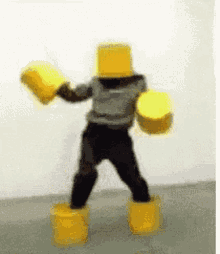 a person with a yellow box on their head
