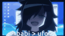 a girl in front of a computer screen with the words babi > ufo above her