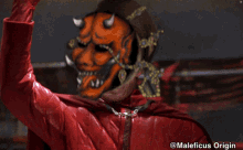 a picture of a devil with the words game over behind him
