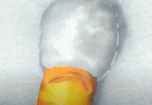 a cartoon character with a red and yellow face