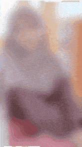 a close up of a person 's face with a blurry background