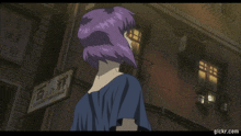 a woman with purple hair is standing in front of a building with a sign that says celebrity housing