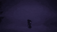 a white light shines in the dark with a dark background