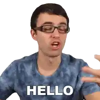 a man with glasses and a tie dye shirt says hello