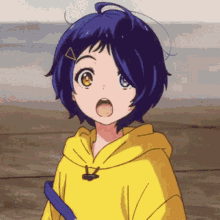 a girl with blue hair and a yellow hoodie is standing on a wooden dock .