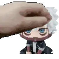 a pixel art of a hand touching a figurine of a character .