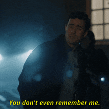 a man says " you don t even remember me " in a dark room