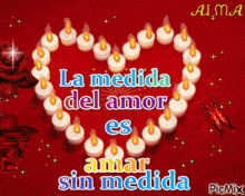 a heart made of candles with the words la medida del amor es amar sin medida on it
