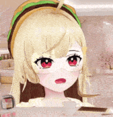 a girl with a hamburger hat on her head