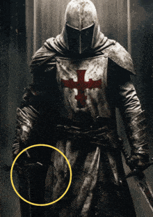 a knight in armor with a red cross on his chest