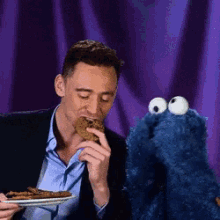Tom Hiddleston Loki GIF - Tom Hiddleston Loki Cookie Monster GIFs