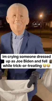 a man dressed as joe biden is crying while trick or treating