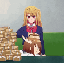 a girl brushing another girl 's hair in front of a stack of money