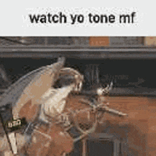 a cat is riding a horse with a sword in its mouth and a caption that says `` watch yo tone mf '' .