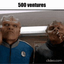 two aliens smoking cigarettes with the words 500 ventures written above them