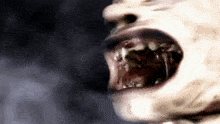 a close up of a person 's mouth with blood coming out of it
