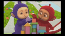 two teletubbies are playing with blocks together in a cartoon