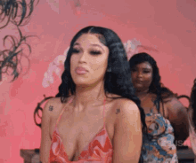 a woman with a tattoo on her shoulder that says zeus on it