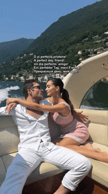a man and a woman are sitting on a boat with a caption that says o zi perfecta prietene